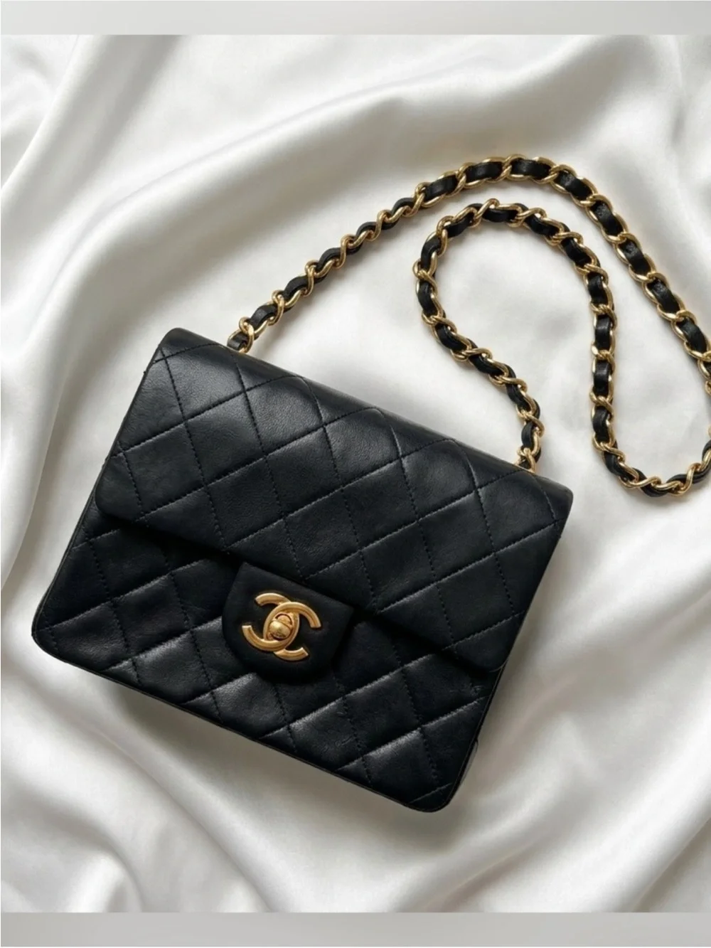 CHANEL Black Quilted Leather Crossbody with Gold Chain